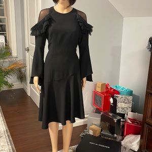 Scripted black ruffle shoulder black cocktail dress